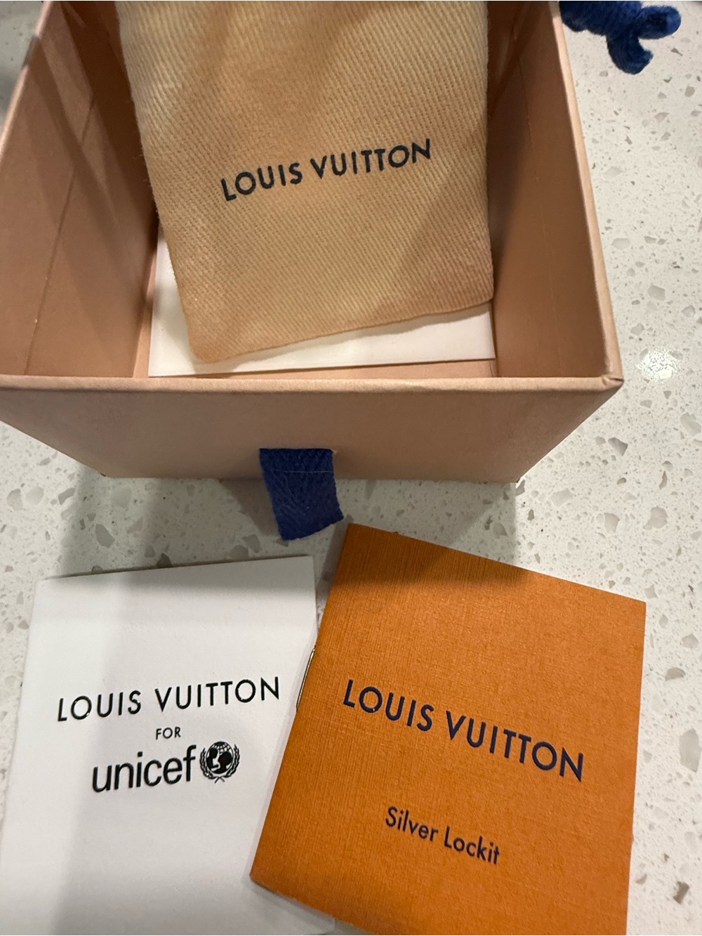 Louis Vuitton Orange Unicef Lockit Bracelet with box and pouch /paperwork